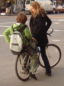single mom and child on bike